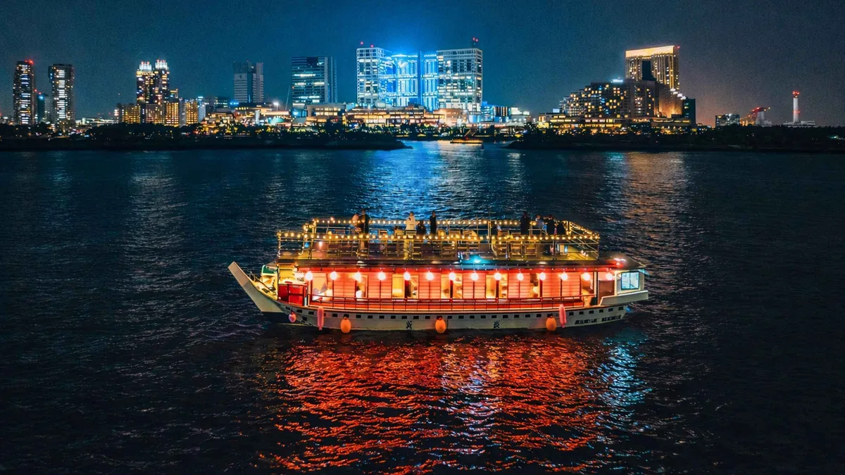 Yakatabune houseboat cruising past Odaiba Bay with a sukiyaki dinner service, Odaiba Tokyo Japan
